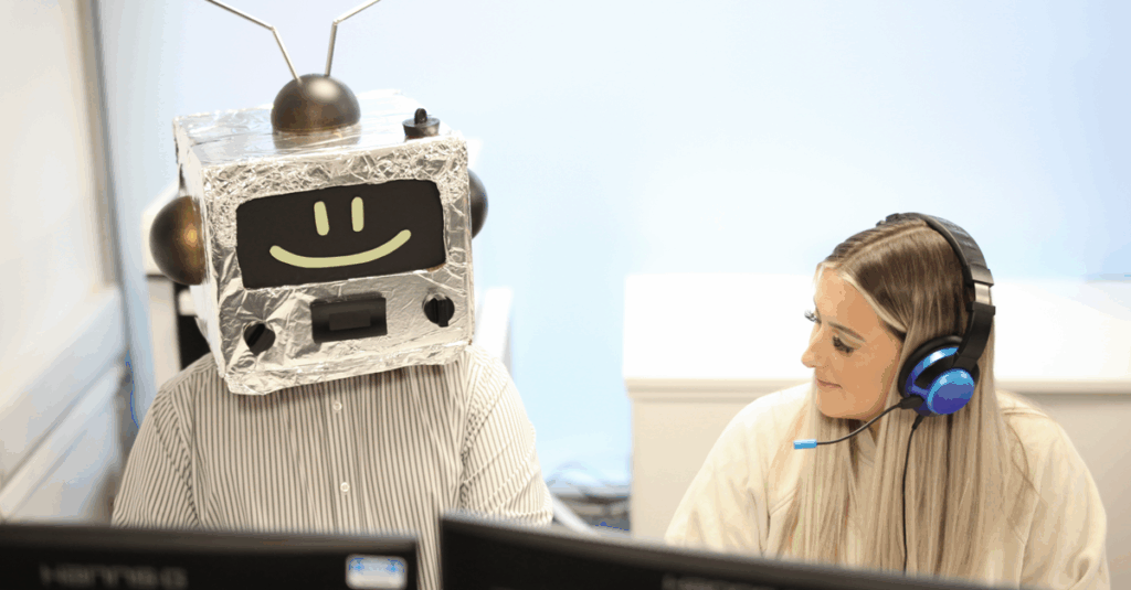 call centre agent looking at AI chat bot